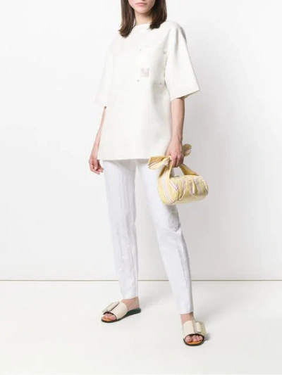 Shop Agnona Crinkled Trousers In White