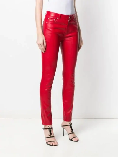 Shop Saint Laurent Slim-fit Leather Trousers In Red
