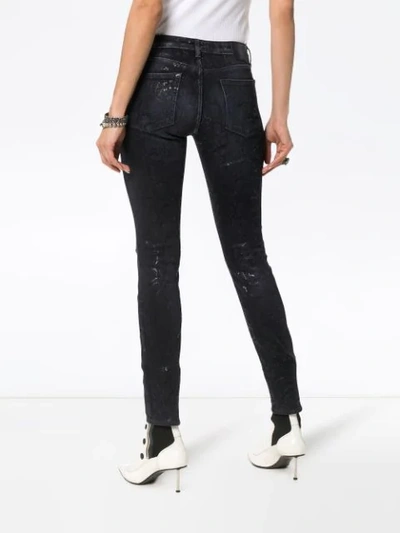 Shop R13 Alison Snake Print Skinny Jeans In Black