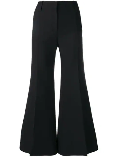 Shop Valentino Flared Trousers In Black