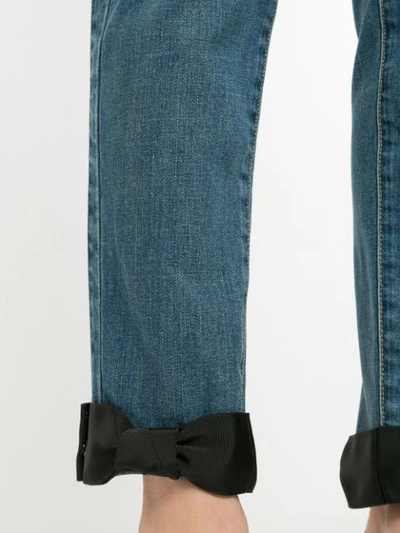 Shop Tu Es Mon Tresor Skinny-jeans Mit Schleifen In Blue