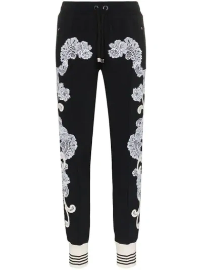 Shop Dolce & Gabbana Lace Embellished Track Pants In Black