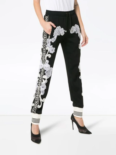 Shop Dolce & Gabbana Lace Embellished Track Pants In Black