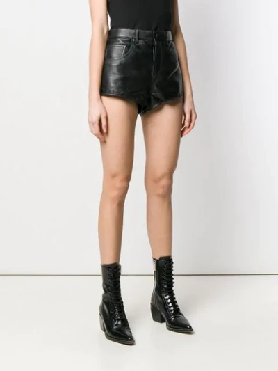 Shop Saint Laurent Leather Flared Shorts In Black