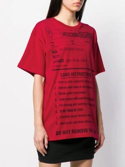 Shop Moschino Care Label Print T-shirt In Red