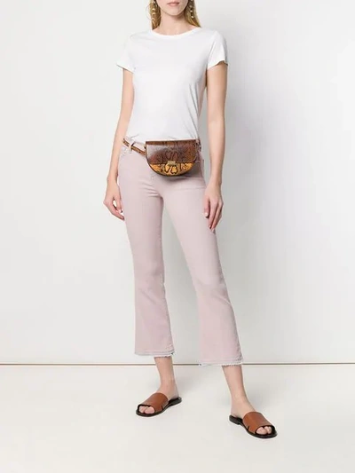 Shop J Brand Cropped Flared Jeans In Pink