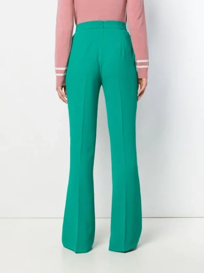 Shop Pinko Flared Trousers In Green