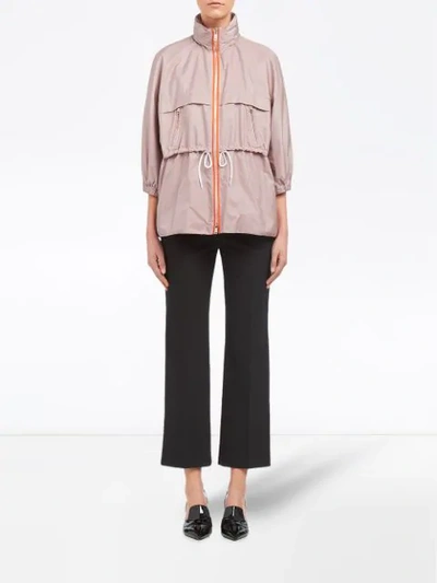 Shop Prada Feather Nylon Rain Coat In Neutrals