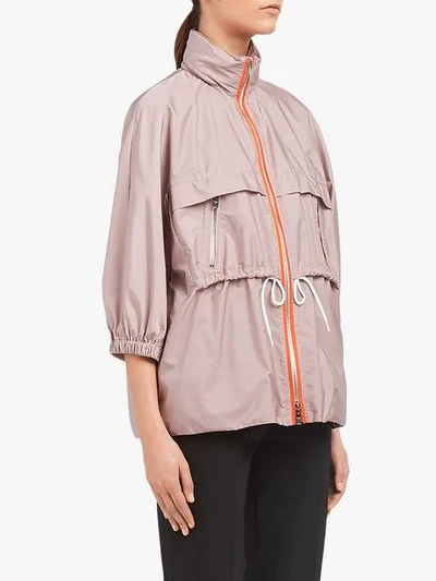 Shop Prada Feather Nylon Rain Coat In Neutrals