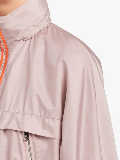 Shop Prada Feather Nylon Rain Coat In Neutrals