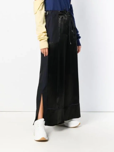 Shop Sacai Contrast Panel Palazzo Trousers In Black