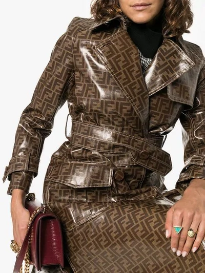 Shop Fendi Ff Motif Plastic-finish Trench Coat In Brown