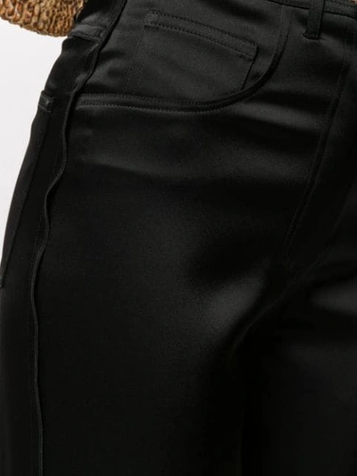 Shop Nanushka Marfa Satin Trousers In Black