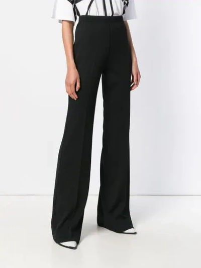 Shop Prada Ribbed Flared Tailored Trousers In Black