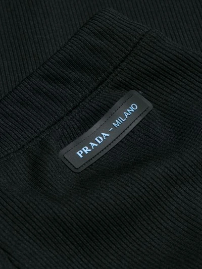 Shop Prada Ribbed Flared Tailored Trousers In Black