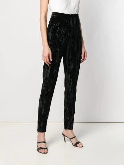 Shop Saint Laurent Wrinkled Effect Trousers In Black