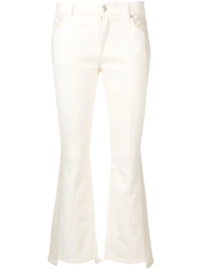 Shop Alexander Mcqueen Cropped Flared Trousers - White