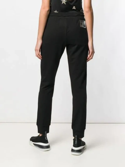 Shop Philipp Plein Sequinned Logo Jogging Bottoms In Black