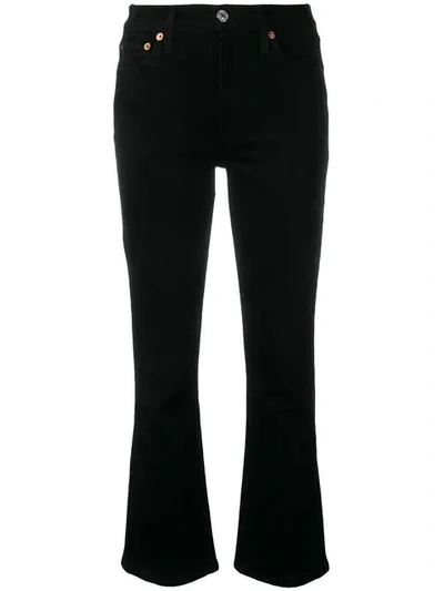 Shop Re/done Mid Rise Kick Flare Jeans In Black