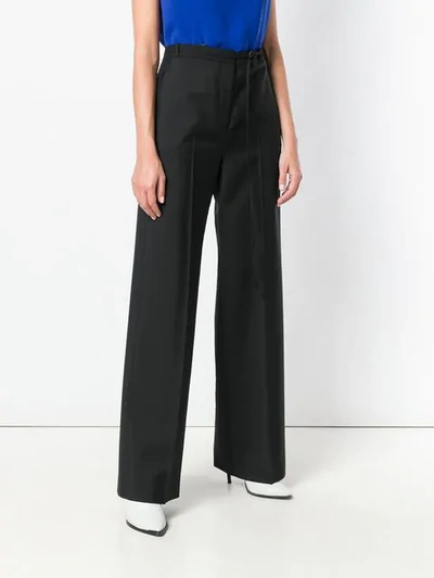 Shop Jil Sander High-waisted Trousers In Black