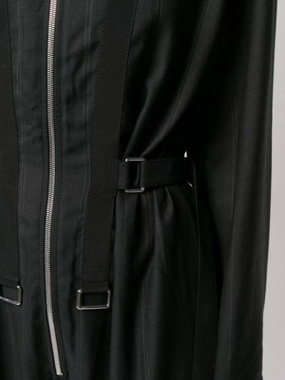 Shop Stella Mccartney Zipped Striped Jumpsuit In Black