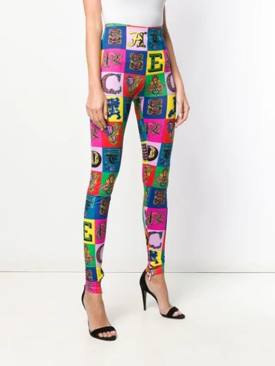 Shop Versace Lettering Mosaic Leggings In Black