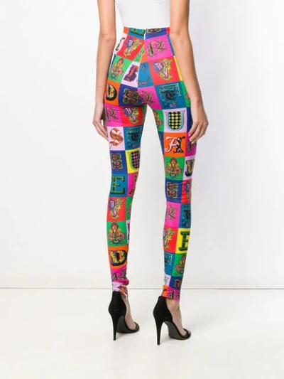 Shop Versace Lettering Mosaic Leggings In Black