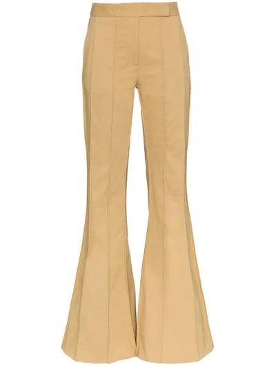 Shop Rosie Assoulin Corduroy Pleated Flare Trousers In Green