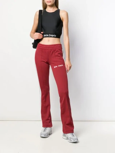 Shop Palm Angels Stripe Detail Track Pants In Red