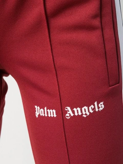 Shop Palm Angels Stripe Detail Track Pants In Red