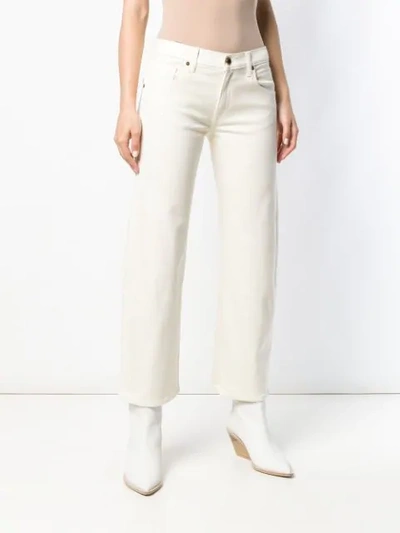 Shop Khaite Low Rise Straight-leg Jeans In White
