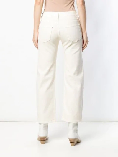 Shop Khaite Low Rise Straight-leg Jeans In White