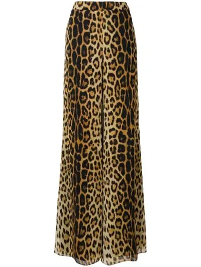 Shop Moschino Flared Leopard Print Trousers In Neutrals