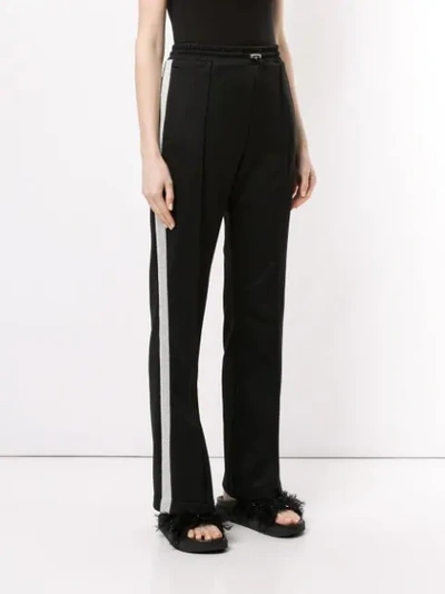 Shop Moncler Flared Track Trousers In Black