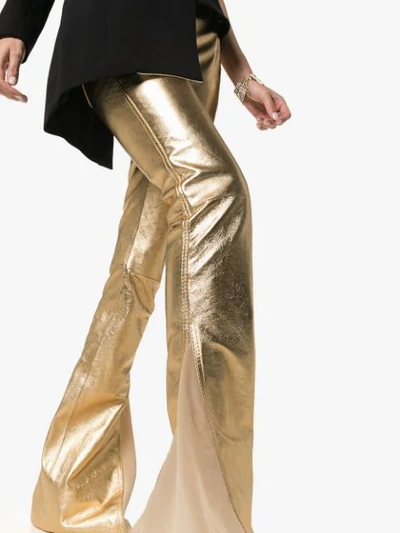 Shop Ronald Van Der Kemp Metallic Flared Trousers In Gold