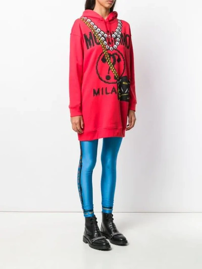 Shop Moschino Printed Logo Longline Hoodie In Red