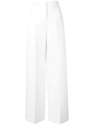 Shop Jil Sander High-waisted Flared Trousers In White
