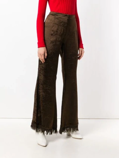 Shop Marni Frayed Flared Trousers In Brown