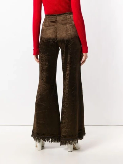 Shop Marni Frayed Flared Trousers In Brown