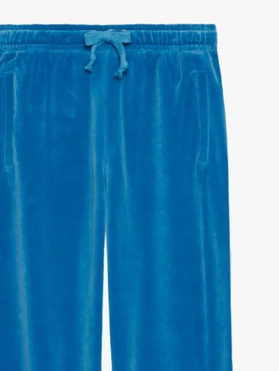 Shop Gucci Tapered Velvet Track Pants - Blue