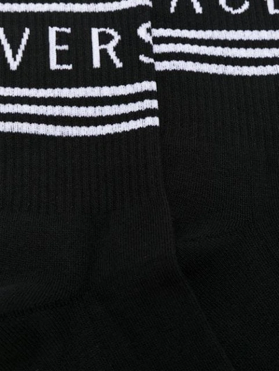 Shop Versace Jacquard Logo Knit Socks In I464