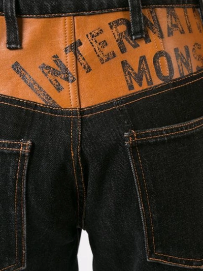 Shop Monse Leather Yoke Jeans In Black