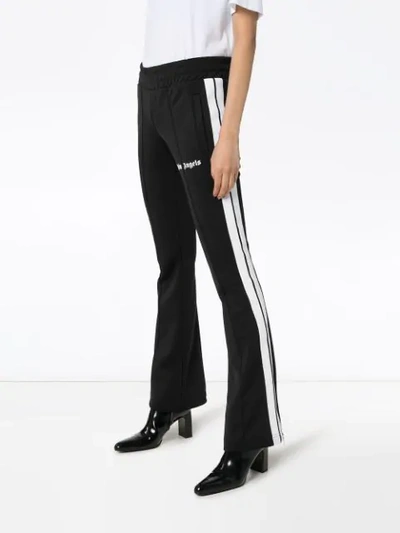 Shop Palm Angels Flared Track Pants In Black
