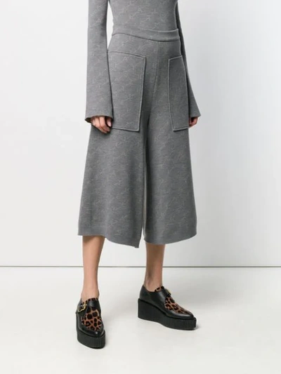 Shop Stella Mccartney Monogram Knit Trousers In Grey