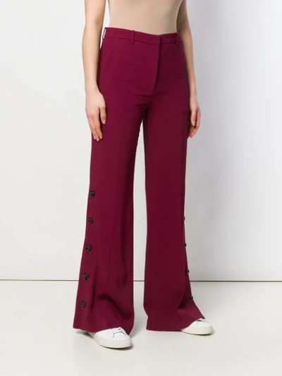 Shop Joseph Tailored Flared Trousers In Red