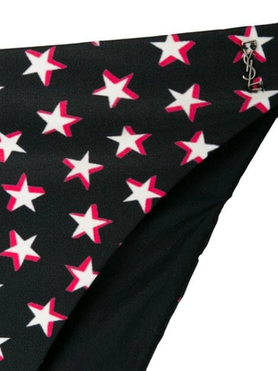 Shop Saint Laurent Star Print Bikini Bottoms In Black