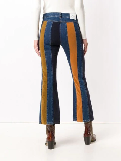 Shop See By Chloé Striped Flare Trousers In Blue