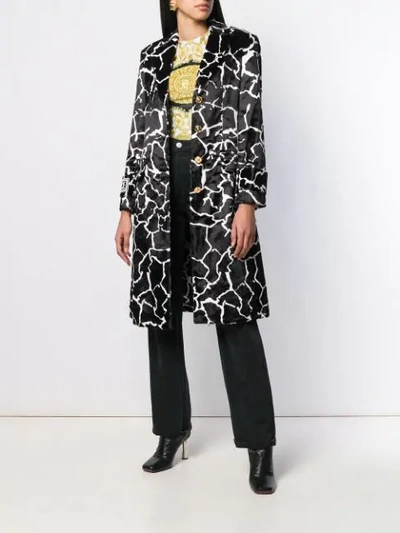 Shop Versace Marble Effect Printed Coat In Black