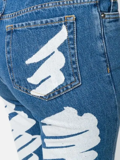 Shop Moschino Brush Stroke Boyfriend Jeans In Blue