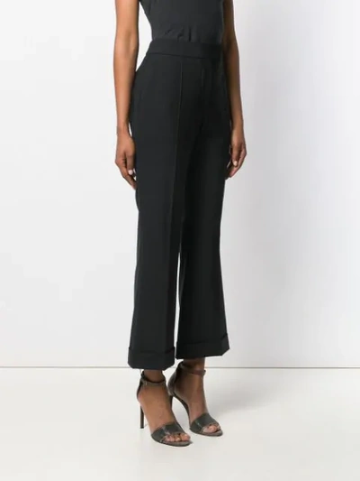 Shop Brunello Cucinelli Cropped Flared Trousers In Black